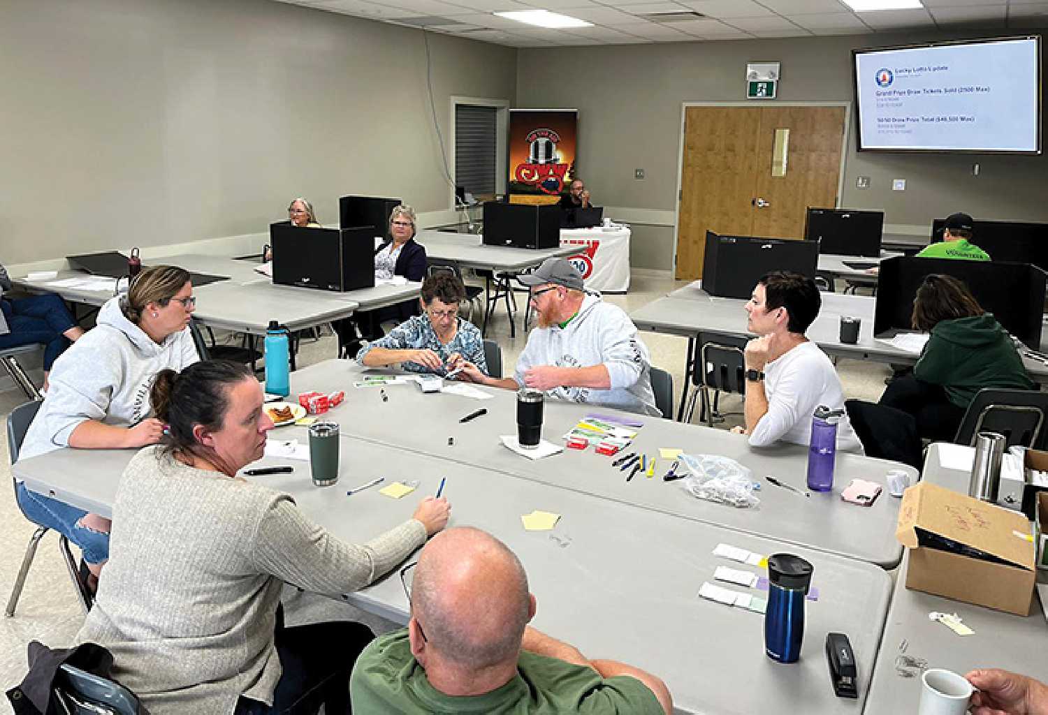 Volunteers working on ticket sales for the Lucky Lottery.